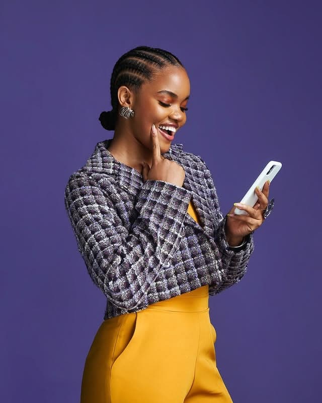 Smiling at phone
